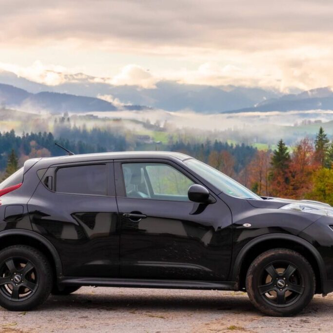 black-car-mountain-scenery-side-view