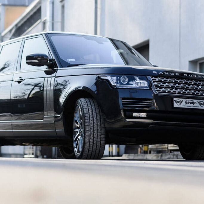 black-range-rover-suv-urban-setting