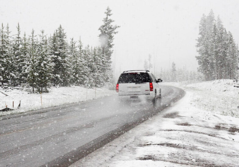snowy-road-driving-suv-winter-weather
