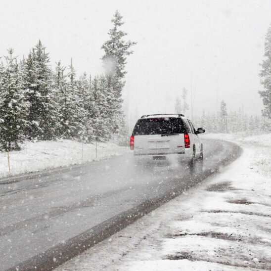snowy-road-driving-suv-winter-weather